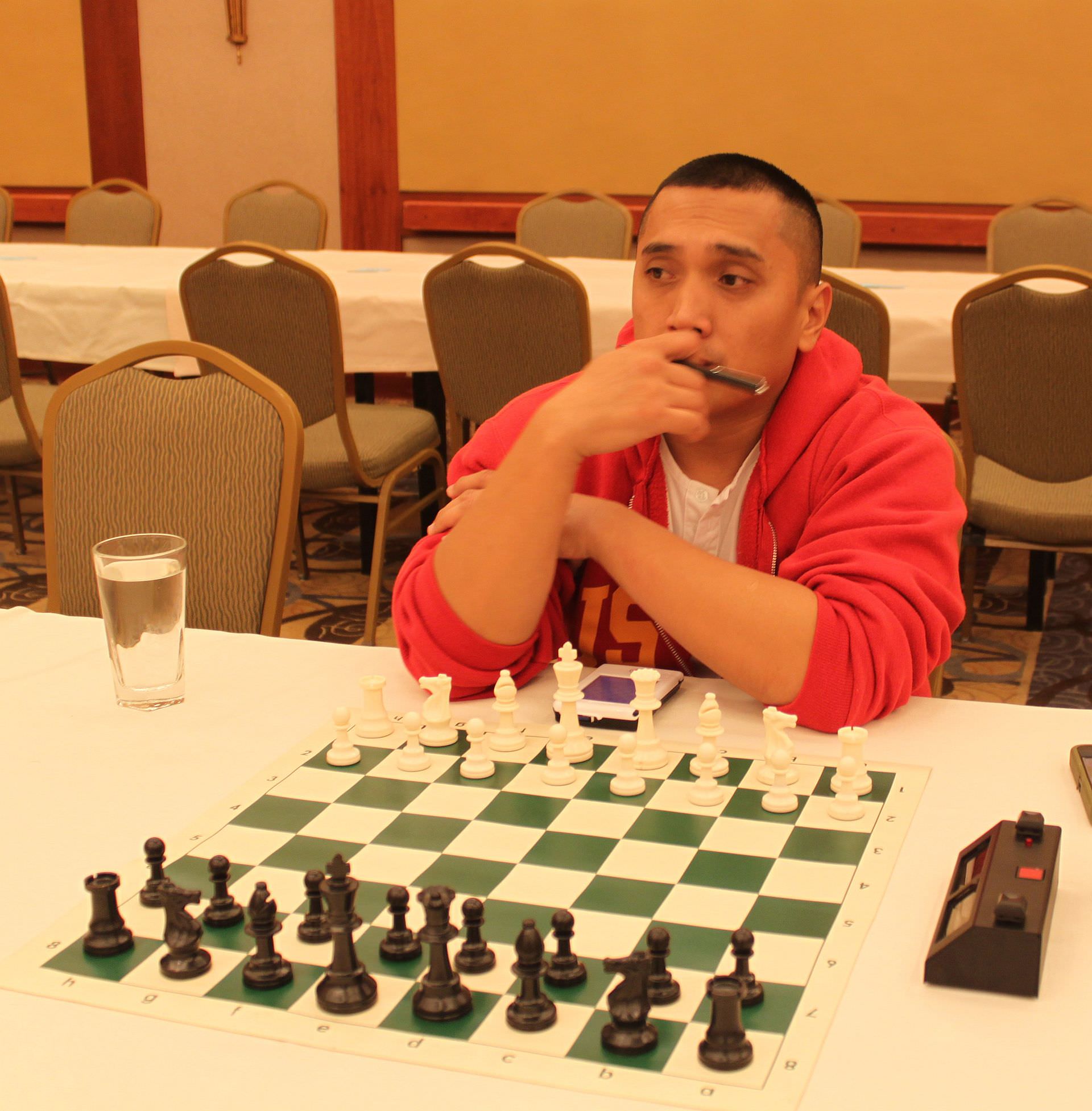 CCLA member Errol Acosta photographed at the chess board
